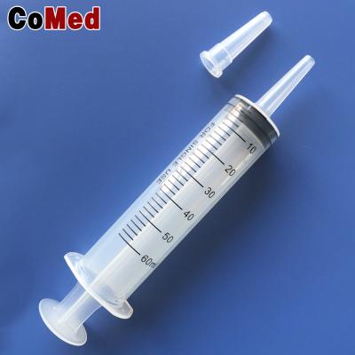 China Large disposable irrigating and feeding syringe with 20 caps for sale