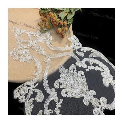 China Viable High Quality 100% Polyester Beaded and Sequined Floral Embroidery Tulle Lace Trim Bridal Applique for sale