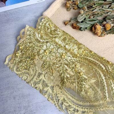 China Polyester handmade high quality custom gold embroidery sequin lace trim beaded fabric with beads for wedding bridal dress for sale