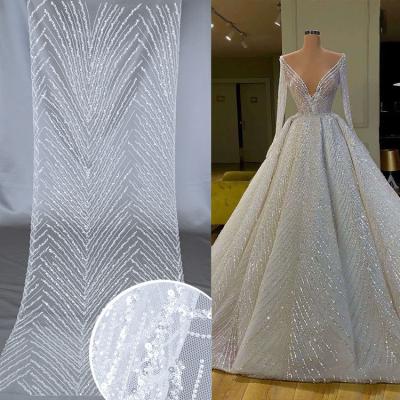 China New Design Handmade High Quality 3D Flower Elegant White Bridal Lace Fabric With Sequins And Beads For Women Wedding Bridal Dress for sale