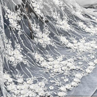 China Beautiful factory direct handmade ivory white luxury sequins beaded bridal lace fabric with sequins for women wedding bridal dress for sale