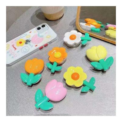 China Plastic Floral Phone Grip Suction Cup Rotating Phone Mount Kawaii Phone Holder Stand for sale