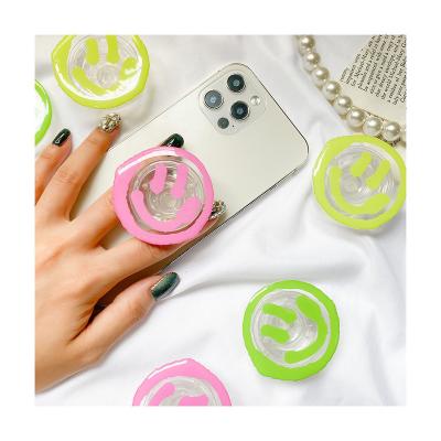 China Cute Plastic Phone Stand Smile Face Finger Ring Grip Holder Kickstand For iPhone for sale