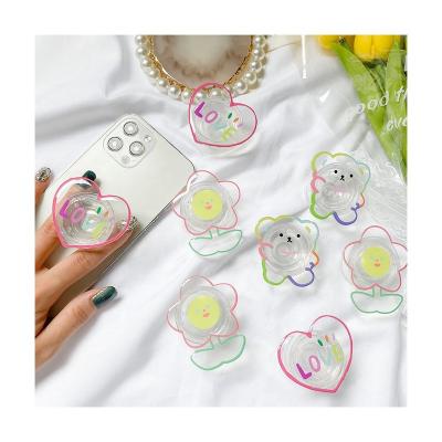 China Plastic Phone Grip With Suction Cup Universally Compatible Clear Floral Phone Ring Golder for sale