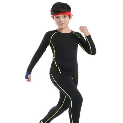 China Breathable Sports Fitness Kids Long Sleeve Sports Stretch Football Clothes Quick Dry Tight Top And Pants for sale