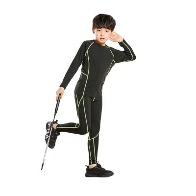 China Kids Breathable Fitness Long Sleeve Sports Stretch Football Clothes Quick Dry Tight Top And Pants for sale