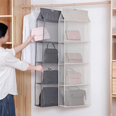 China New Handbag Storage Bag Household Wardrobe Storage Transparent Bag Organizer Folding Double-Sided Hanging Bag for sale