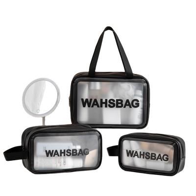 China Modern simple waterproof travel toiletry bag travel PU letter transparent large capacity cosmetic bag for sale