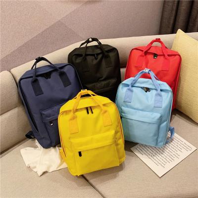 China Custom Anti-theft Color Backpack Candy Canvas Logo Twin Handle Backpack For Girls for sale