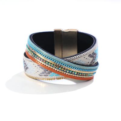 China CLASSIC real leather and PU bracelet with magnet closed, glass stone in claw, hot sale with hand work. for sale