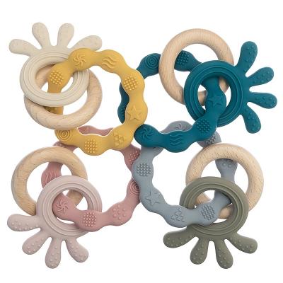 China New Design Eco-Friendly Natural Baby Kids Food Grade Sensory Teether Toys Soft Bpa Free Silicone Baby Teethers Wooden Ring for sale