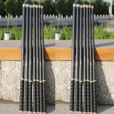 China Portable Carbon Fiber Fishing Rod 2.7m-10m Size Telescopic Rod Fishing Long Section Hand Empty Poles for sale