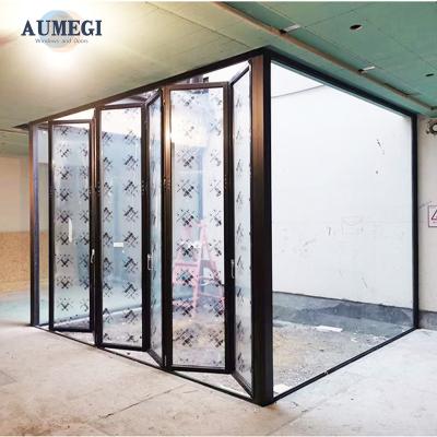 China Sound Insulation Aumegi Made in Guangdong Tempered Glass Slim Frame Glass Folding Door Bifold Interior Doors for sale