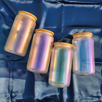 China Hotsale new style 16oz gradient sublimation stocked glass can glow in the dark glass mug with glitter rainbow tumbler for sale