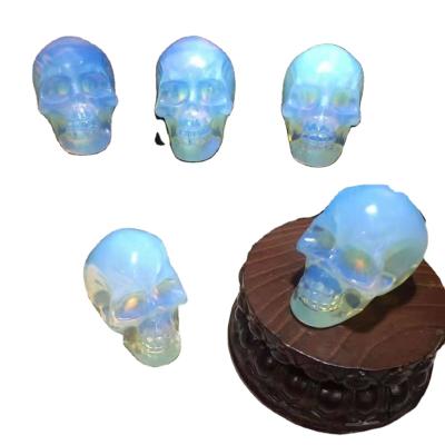 China China Crystal Healing Stone Snake Crystal White Opal Skulls Head Folk Crafts with Snake for fengshui home decoration for sale