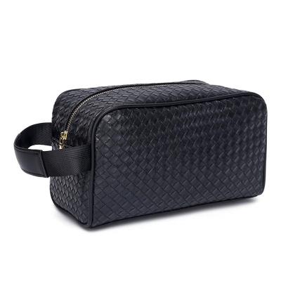 China Custom Hip Hop Fashion Logo Black Luxury Woven Leather Washed Travel Cosmetic Bag for sale