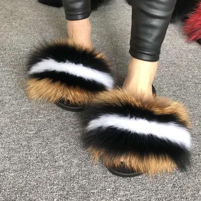 China Fashion Trend Selling Fashion Design Fur Slippers Summer Warm Super Fluffy Fur Slippers Brown Fur Slides for sale