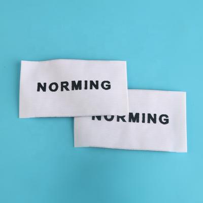 China Sustainable High Quality Apparel Main Labels Custom Brands Logo Textured Damask Woven Labels For Beanies for sale