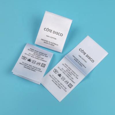 China Sustainable Stylish Custom Printed Brand Logo Washing Instruction Folded Tags Polyester Satin Care Labels For T-shirts for sale