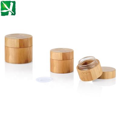 China 30g/50g/100g eco-friendly bamboo glass jar covered bamboo lid bamboo glass bottle for sale