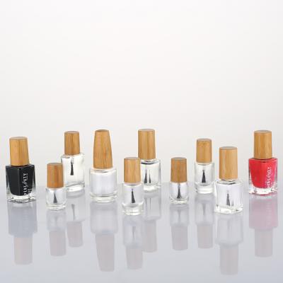 China Eco-friendly custom unique clear empty nail polish bottle 5Ml 8Ml 15Ml with bamboo cover/glass nail polish bottle with lid/bamboo cover for sale