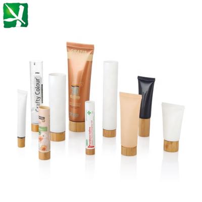 China Eco-friendly Eco-friendly Cosmetic Plastic LDPE Tube Package With Bamboo / Wooden Lids for sale