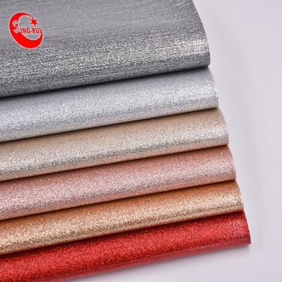 China Elastic Wholesale Glitter PU Leatherette Damping Leather for sale