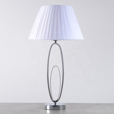 China Nordic Unique Design Metal Lamp Hotel Amazon Newcomer White Bedside Table Lamp for sale