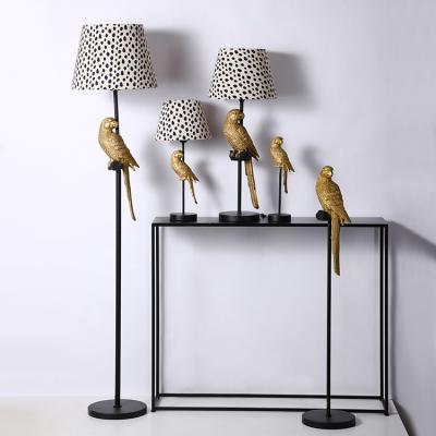 China Modern Unique Resin Decoration Parrot Bird Shape America Gold Cheap Hotel Floor Lamps For Home Living Room for sale