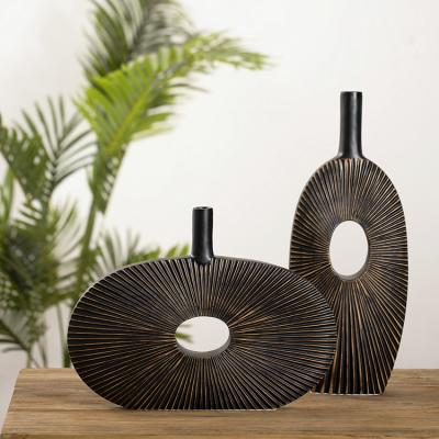 China Elegant New Arrival Flower Vase Art Design Home Decor Black Resin Nordic High Grade Single Vase for sale