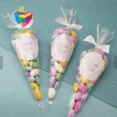 China Yiwu 100/50pcs Transparent Cello Cellophane Maid Treat Display Gift Party Cone Shaped Sweet Bags for sale