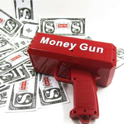 China Custom Funny Money Gun Logo Super Money Shooting Gun Party Props Gun Spray Rain Money Gun for sale