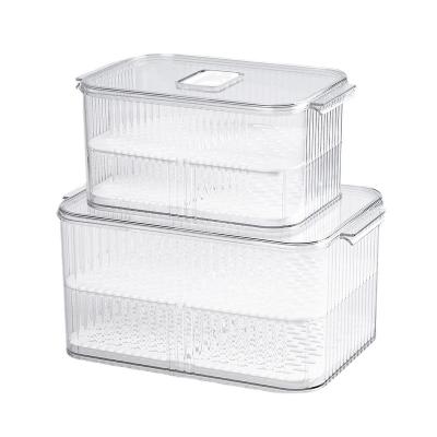 China Storage Box Stackable Plastic Refrigerator Freshness Storage Household Fruits And Vegetables Transparent Drain Basket for sale