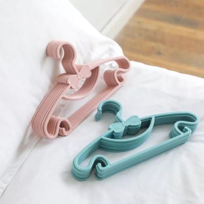 China 0-9 Modern Anti-skid Plastic Coat Hanger Current Year Children Clothes Hanger Kids Clothes Hanger for sale