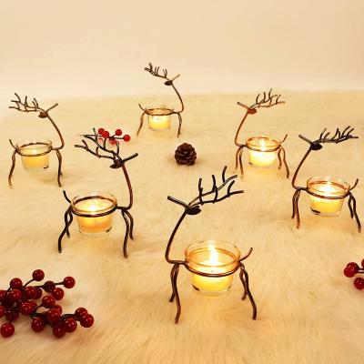 China Home Decoration Metal Christmas Candle Holder Reindeer Tea Light Candle Holders Table Home Decoration for sale