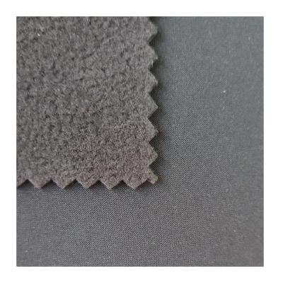 China Waterproof 2023 Year New Design Three Layers Polyamide Warp Knit Bonded Fabric Fleece Fabric Outdoor Fabric for sale