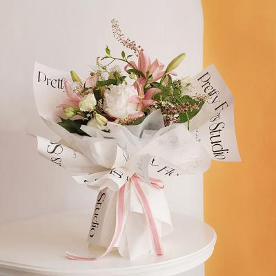 China Wholesale Customized Waterproof Bouquet Wrapping Paper 45*30cm Cheap Florist Packaging Waterproof Flower Wrapping Paper for sale