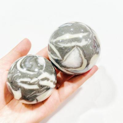 China China Guaranteed Quality Price Wall Decorative Stone Shell Ball Decorative Stone For Suitable Garden for sale