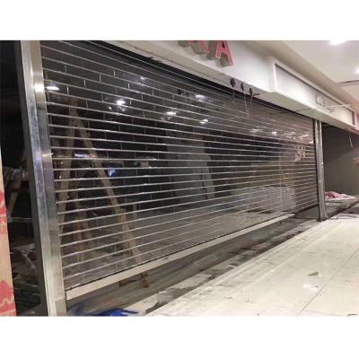 China Anti Theft Storefront Polycarbonate Glass Slats Rolling Door Sliding Doors Polycarbonate for sale