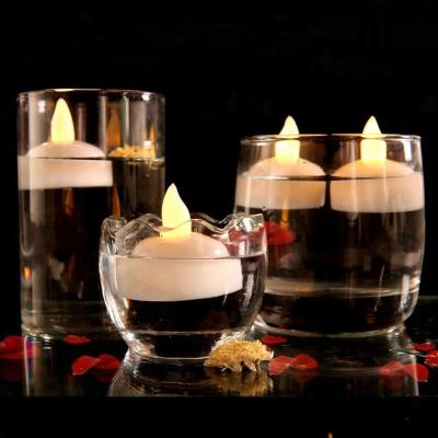 China Homemory LED Flameless Waterproof Floating Tea Light, Flickering Water Activated Floating Candles for Wedding, Party and Festival Decoration for sale