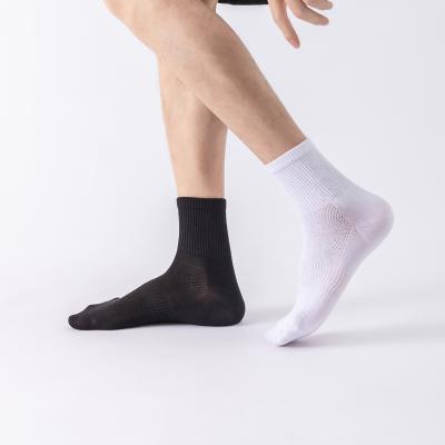 China 2021 QUICK DRY machine socks black white black price combed cotton men's socks solid color mesh working cycling socks for sale