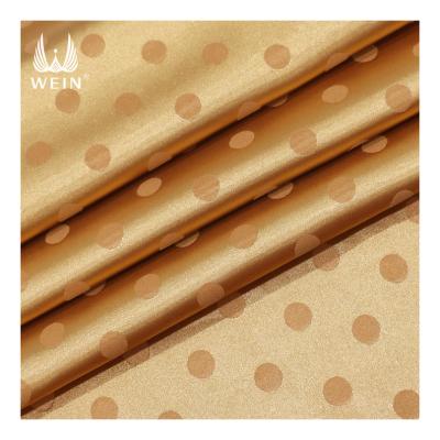 China Newest woven stretch polka dots satin jacquard fabric for evening dress for sale