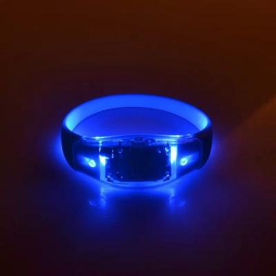 China Custom Logo Sound-activated Glow In The Dark Led Bracelet Concert Wristband for sale