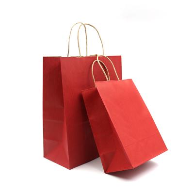 China Custom Recycled Materials Kraft Paper Bag Clothing Shoes Shopping Bag Handles Bags Wholesale With Your Own Logo Printed for sale