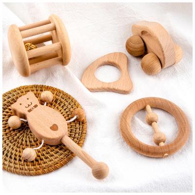 China Toy Cute And Delicate Baby Small Musical Rattle Handle Wooden Hand Bells for sale