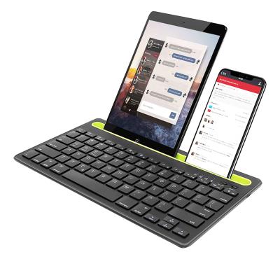 China Wireless Dual Connect Keyboard to Multiple Wireless Devices Built-in Stand Phone Holder for iPhone iPad Android and IOS Tablets Phones for sale