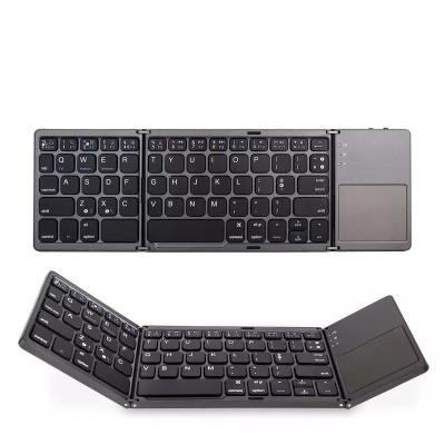 China Wireless Folding Keyboard with Responsive Touchpad Pocket Foldable Tri Fold Keyboard for iPad Mac iPhone Android Windows IOS for sale