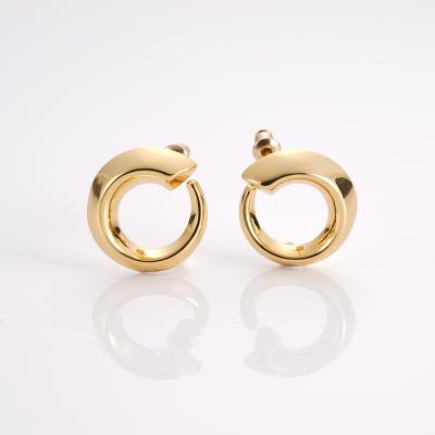 China Hip Hop Gold Plated Simple Smooth C Shape Earrings Twisted Circle Hoop Earrings For Women for sale