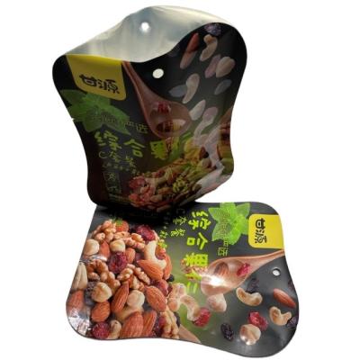 China Safety Shape Food Grade Plastic Packaging Bag Special Custom Snack Nut Bag for sale