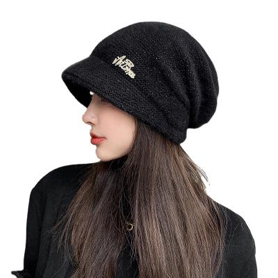 China COMMON Pile of hats autumn and winter female Korean version of the woolen rabbit wild fur hat warm and cold protective knitted hat for sale